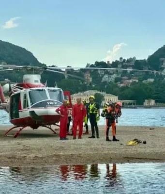 Bambina di 9 anni scompare nel lago di Como dopo un tuffo: ricerche disperate, il bagno era vietato Elisoccorso lago di Como